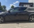 Черный Опель Инсигния, объемом двигателя 2 л и пробегом 240 тыс. км за 4472 $, фото 1 на Automoto.ua