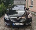 Черный Опель Инсигния, объемом двигателя 2 л и пробегом 230 тыс. км за 7800 $, фото 1 на Automoto.ua