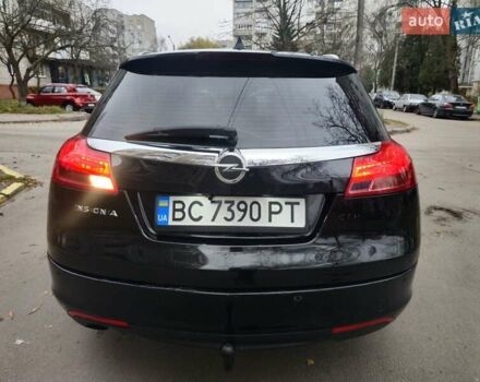 Чорний Опель Інсігнія, об'ємом двигуна 2 л та пробігом 292 тис. км за 5650 $, фото 4 на Automoto.ua