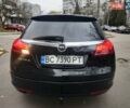 Чорний Опель Інсігнія, об'ємом двигуна 2 л та пробігом 292 тис. км за 5650 $, фото 4 на Automoto.ua