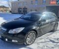 Чорний Опель Інсігнія, об'ємом двигуна 2 л та пробігом 277 тис. км за 9300 $, фото 5 на Automoto.ua