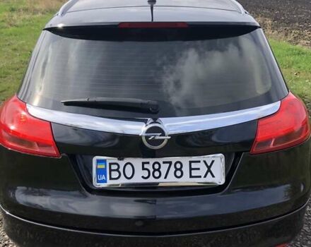 Чорний Опель Інсігнія, об'ємом двигуна 1.96 л та пробігом 370 тис. км за 9000 $, фото 6 на Automoto.ua