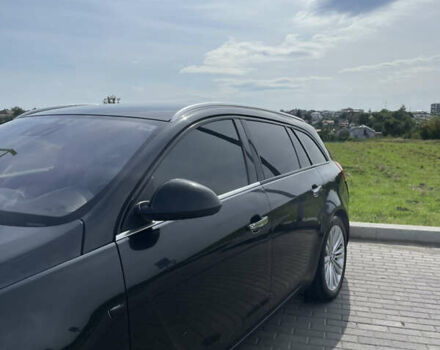 Чорний Опель Інсігнія, об'ємом двигуна 1.96 л та пробігом 251 тис. км за 8850 $, фото 1 на Automoto.ua