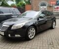 Чорний Опель Інсігнія, об'ємом двигуна 1.96 л та пробігом 301 тис. км за 7600 $, фото 1 на Automoto.ua