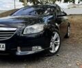 Черный Опель Инсигния, объемом двигателя 1.96 л и пробегом 216 тыс. км за 10000 $, фото 1 на Automoto.ua