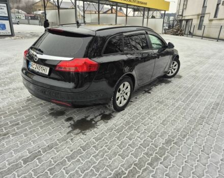 Черный Опель Инсигния, объемом двигателя 2 л и пробегом 259 тыс. км за 8200 $, фото 2 на Automoto.ua