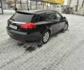 Черный Опель Инсигния, объемом двигателя 2 л и пробегом 259 тыс. км за 8200 $, фото 2 на Automoto.ua
