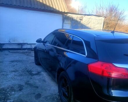 Чорний Опель Інсігнія, об'ємом двигуна 2 л та пробігом 297 тис. км за 7499 $, фото 4 на Automoto.ua