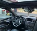 Чорний Опель Інсігнія, об'ємом двигуна 1.96 л та пробігом 208 тис. км за 12000 $, фото 2 на Automoto.ua