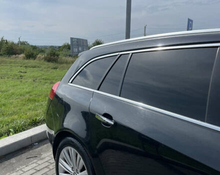 Чорний Опель Інсігнія, об'ємом двигуна 1.96 л та пробігом 251 тис. км за 8850 $, фото 5 на Automoto.ua