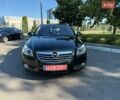 Чорний Опель Інсігнія, об'ємом двигуна 1.6 л та пробігом 191 тис. км за 9000 $, фото 1 на Automoto.ua