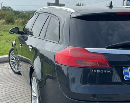 Чорний Опель Інсігнія, об'ємом двигуна 1.96 л та пробігом 251 тис. км за 8850 $, фото 12 на Automoto.ua