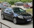 Черный Опель Инсигния, объемом двигателя 2 л и пробегом 207 тыс. км за 9100 $, фото 1 на Automoto.ua