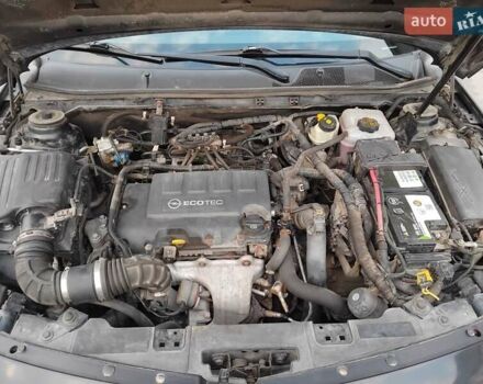 Черный Опель Инсигния, объемом двигателя 1.4 л и пробегом 344 тыс. км за 6800 $, фото 1 на Automoto.ua