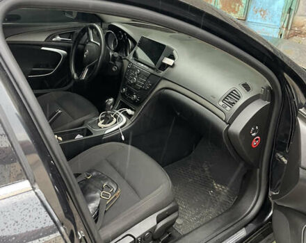 Черный Опель Инсигния, объемом двигателя 1.96 л и пробегом 302 тыс. км за 7700 $, фото 1 на Automoto.ua