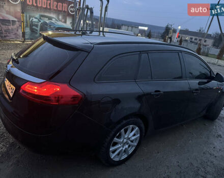 Чорний Опель Інсігнія, об'ємом двигуна 1.96 л та пробігом 205 тис. км за 8000 $, фото 6 на Automoto.ua