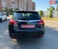 Чорний Опель Інсігнія, об'ємом двигуна 1.6 л та пробігом 191 тис. км за 9000 $, фото 4 на Automoto.ua