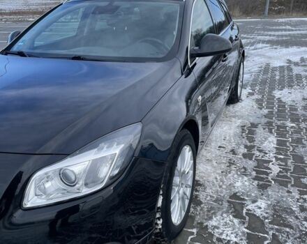 Черный Опель Инсигния, объемом двигателя 2 л и пробегом 244 тыс. км за 10300 $, фото 1 на Automoto.ua