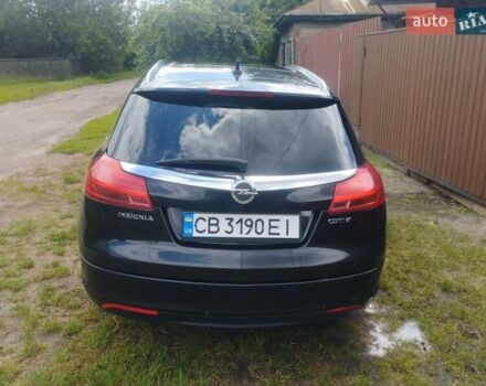 Чорний Опель Інсігнія, об'ємом двигуна 2 л та пробігом 264 тис. км за 8700 $, фото 4 на Automoto.ua