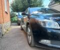 Чорний Опель Інсігнія, об'ємом двигуна 1.96 л та пробігом 292 тис. км за 8800 $, фото 1 на Automoto.ua