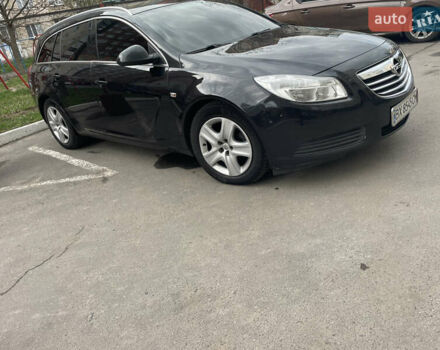 Черный Опель Инсигния, объемом двигателя 1.96 л и пробегом 302 тыс. км за 7700 $, фото 3 на Automoto.ua