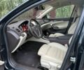 Черный Опель Инсигния, объемом двигателя 1.6 л и пробегом 191 тыс. км за 8416 $, фото 1 на Automoto.ua