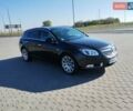 Чорний Опель Інсігнія, об'ємом двигуна 2 л та пробігом 270 тис. км за 10550 $, фото 2 на Automoto.ua