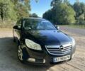 Черный Опель Инсигния, объемом двигателя 2 л и пробегом 331 тыс. км за 7200 $, фото 1 на Automoto.ua