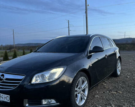 Чорний Опель Інсігнія, об'ємом двигуна 1.96 л та пробігом 255 тис. км за 7000 $, фото 1 на Automoto.ua