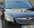 Чорний Опель Інсігнія, об'ємом двигуна 2 л та пробігом 199 тис. км за 9590 $, фото 2 на Automoto.ua