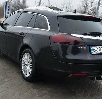 Черный Опель Инсигния, объемом двигателя 1.96 л и пробегом 245 тыс. км за 8599 $, фото 2 на Automoto.ua