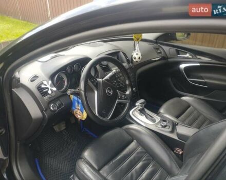 Чорний Опель Інсігнія, об'ємом двигуна 2 л та пробігом 264 тис. км за 8700 $, фото 6 на Automoto.ua