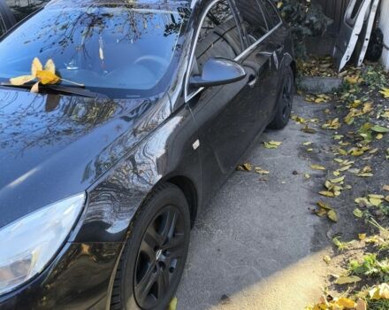 Черный Опель Инсигния, объемом двигателя 2 л и пробегом 304 тыс. км за 7700 $, фото 1 на Automoto.ua