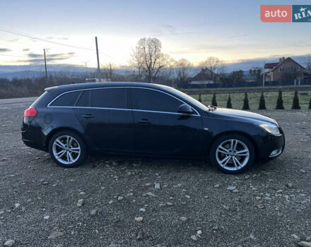 Чорний Опель Інсігнія, об'ємом двигуна 1.96 л та пробігом 255 тис. км за 7000 $, фото 7 на Automoto.ua