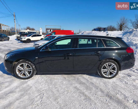 Чорний Опель Інсігнія, об'ємом двигуна 1.96 л та пробігом 210 тис. км за 8999 $, фото 2 на Automoto.ua