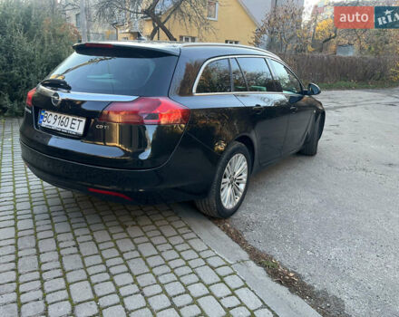 Чорний Опель Інсігнія, об'ємом двигуна 2 л та пробігом 261 тис. км за 8500 $, фото 6 на Automoto.ua