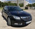 Чорний Опель Інсігнія, об'ємом двигуна 2 л та пробігом 254 тис. км за 8000 $, фото 1 на Automoto.ua