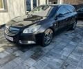 Чорний Опель Інсігнія, об'ємом двигуна 1.96 л та пробігом 260 тис. км за 8500 $, фото 2 на Automoto.ua