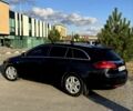 Чорний Опель Інсігнія, об'ємом двигуна 2 л та пробігом 216 тис. км за 7300 $, фото 4 на Automoto.ua