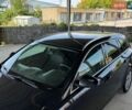 Чорний Опель Інсігнія, об'ємом двигуна 2 л та пробігом 253 тис. км за 8299 $, фото 4 на Automoto.ua