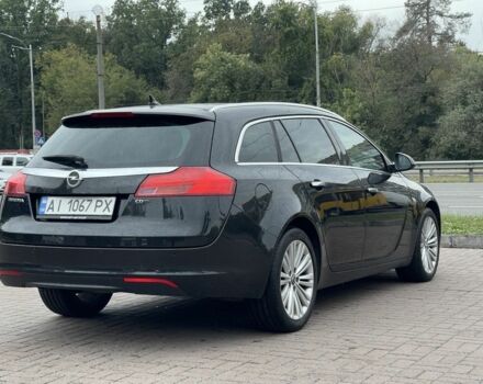 Черный Опель Инсигния, объемом двигателя 2 л и пробегом 309 тыс. км за 8800 $, фото 3 на Automoto.ua