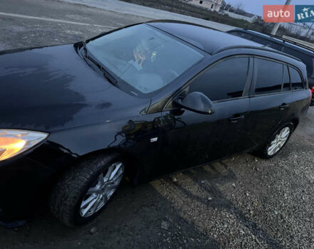 Чорний Опель Інсігнія, об'ємом двигуна 1.96 л та пробігом 205 тис. км за 8000 $, фото 5 на Automoto.ua