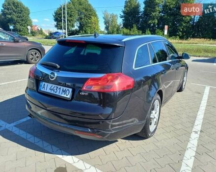 Черный Опель Инсигния, объемом двигателя 2 л и пробегом 250 тыс. км за 10500 $, фото 9 на Automoto.ua