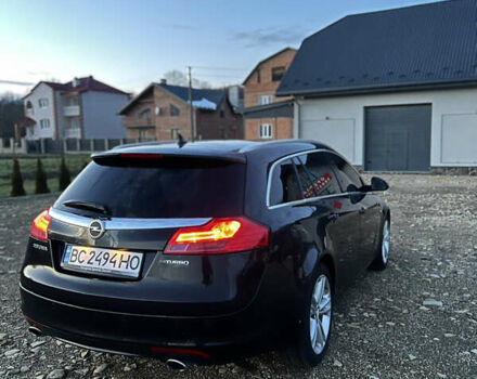 Чорний Опель Інсігнія, об'ємом двигуна 1.96 л та пробігом 255 тис. км за 7000 $, фото 11 на Automoto.ua