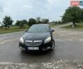 Чорний Опель Інсігнія, об'ємом двигуна 1.96 л та пробігом 305 тис. км за 6600 $, фото 1 на Automoto.ua