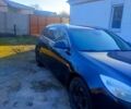 Чорний Опель Інсігнія, об'ємом двигуна 2 л та пробігом 297 тис. км за 7499 $, фото 1 на Automoto.ua