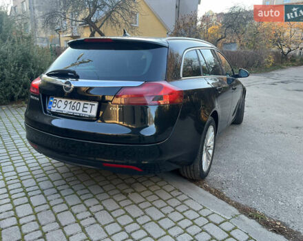 Чорний Опель Інсігнія, об'ємом двигуна 2 л та пробігом 261 тис. км за 8500 $, фото 5 на Automoto.ua