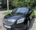 Чорний Опель Інсігнія, об'ємом двигуна 2 л та пробігом 243 тис. км за 7513 $, фото 1 на Automoto.ua