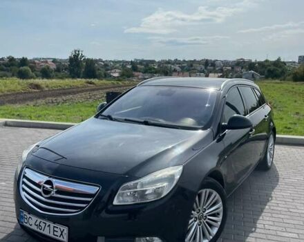 Чорний Опель Інсігнія, об'ємом двигуна 1.96 л та пробігом 256 тис. км за 8175 $, фото 2 на Automoto.ua