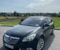 Чорний Опель Інсігнія, об'ємом двигуна 1.96 л та пробігом 256 тис. км за 8175 $, фото 2 на Automoto.ua